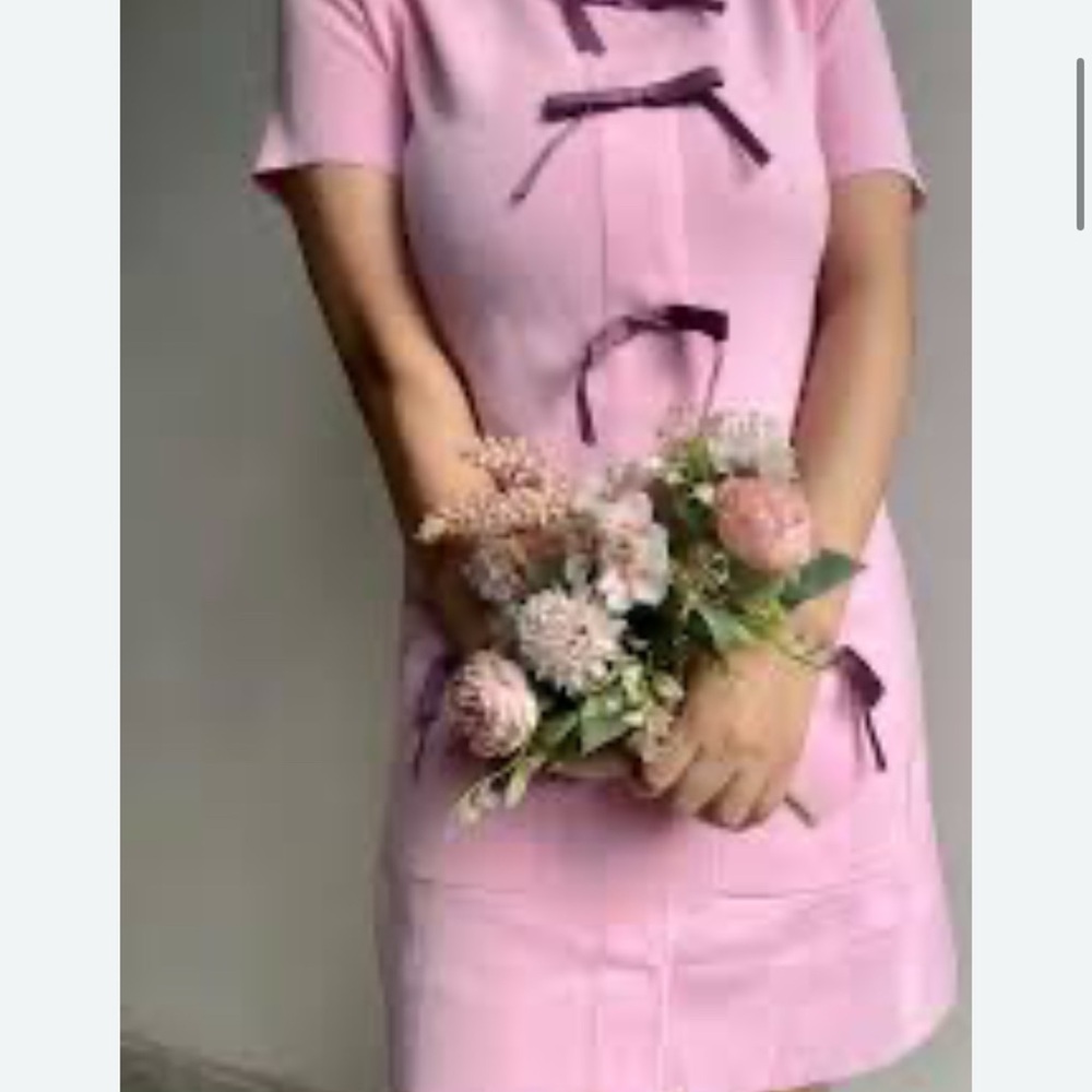 Elegant Pink Dress with Bow Accents